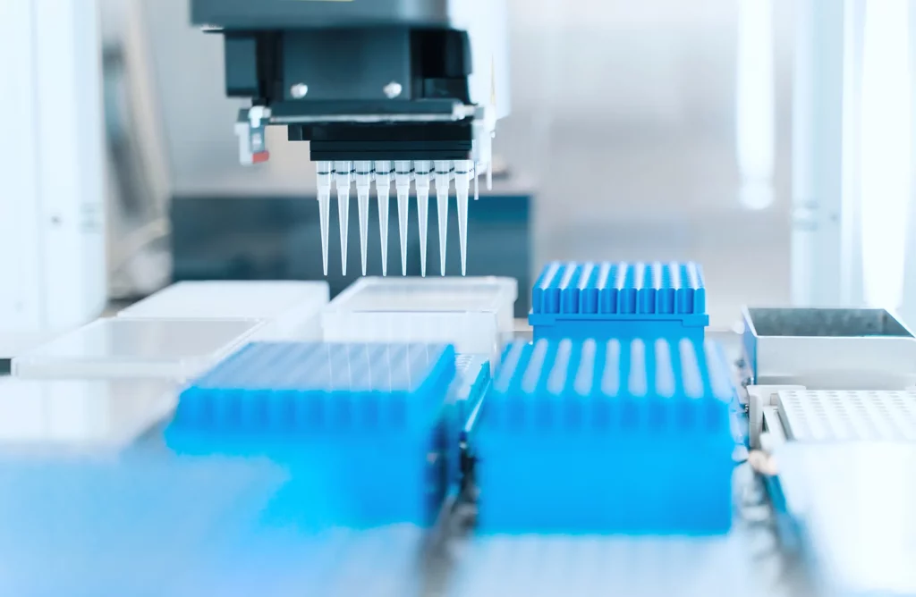 Automated lab machine with rows of test tubes